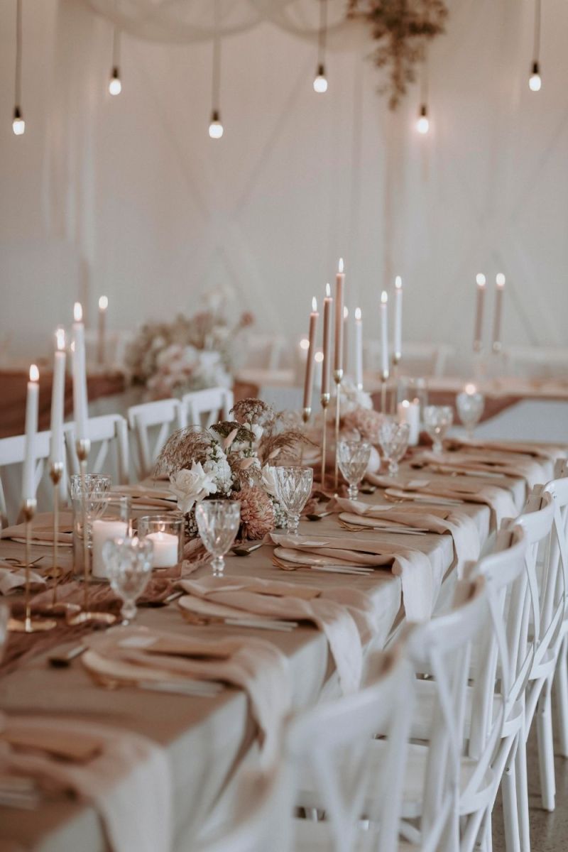 barn wedding with gold taper candles holder candlesticks