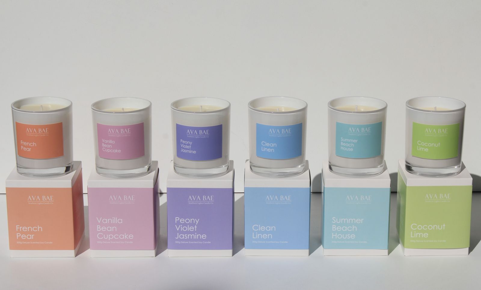 scented candles in pastel colours