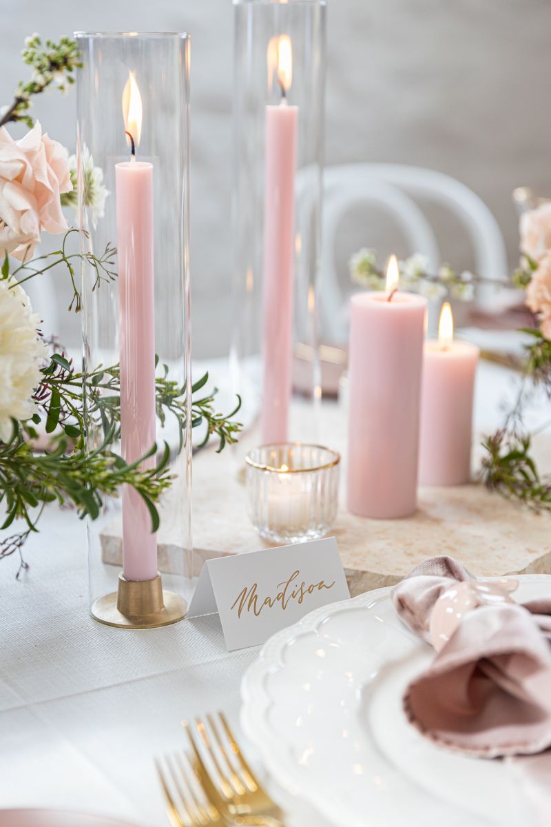 Image of pink candles on wedding table